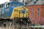 CSX 7675 along Commerce Street with old Piedmont Flour Mills building in background